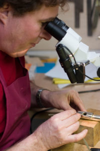 cutting ambouchure with microscope